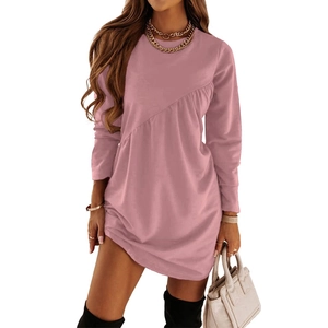 Women's dusty pink long sleeve dress with elegant ruched details and asymmetrical hem