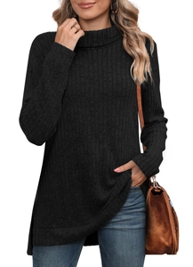 Detail view of the side slit and ribbed knit texture on a black turtleneck long sleeve top