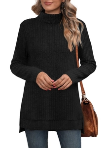 Detail of black ribbed knit turtleneck top featuring elegant side slit hem and long sleeves