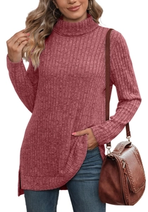 Detail of high neck mauve knit top featuring ribbed texture and side hem slit design