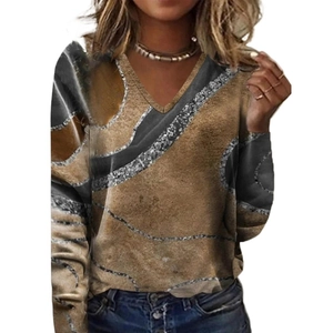 Close-up of V-neck long sleeve top with brown marble texture and silver glitter lines