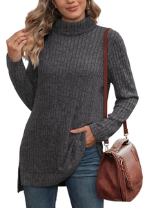Detail of dark charcoal ribbed knit turtleneck with side slit hem and long sleeves