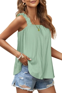 Detail of light green ruffled strap camisole top with textured seersucker fabric finish