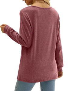 Rear view of dusty rose long sleeve knit top with scoop neck paired with light jeans