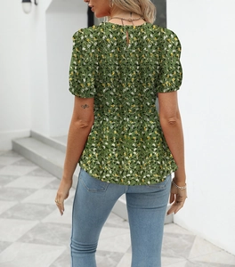 Detailed back view of green floral blouse with smocking and back keyhole chain detail