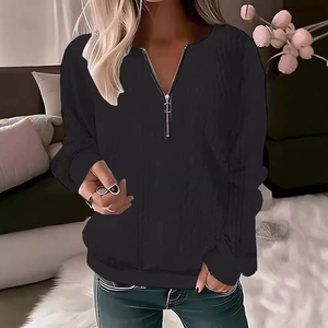 Women's black quarter-zip long sleeve pullover sweater with a ribbed knit texture and V-neck