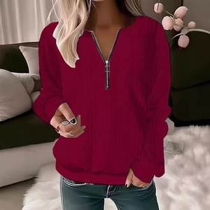 Women's burgundy long sleeve pullover hoodie with quarter zip V-neck and ribbed texture