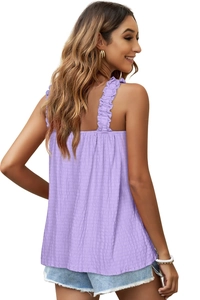 Detail view of purple ribbed tank top featuring ruffled shoulder straps and texture