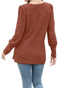 Detail view of the ribbed knit fabric and back design of a caramel long sleeve t-shirt