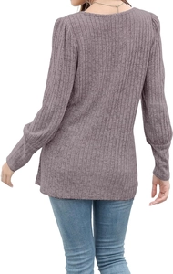 Detail of slim fit long sleeve knit top with back V-neck and lantern sleeves in dusty pink