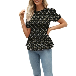 Close-up of black floral summer blouse featuring ruffle hem and bubble short sleeves
