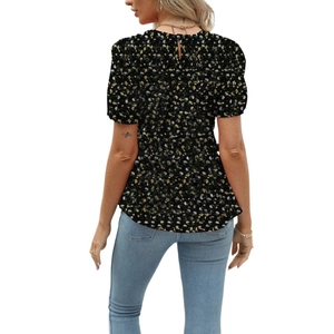 Rear view of floral summer blouse with puffed sleeves and back teardrop button closure
