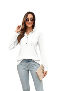 Detailed waffle knit texture and wooden buttons on a white long sleeve hoodie for women