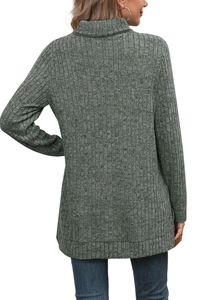 Detail view of the gray-green knitted turtleneck top showing the back fit and ribbed hem
