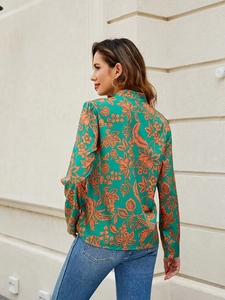 Women's emerald green long sleeve floral blouse with V-neck and orange flower print