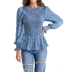 Blue floral long sleeve smocked blouse with peplum waist and round neck for women