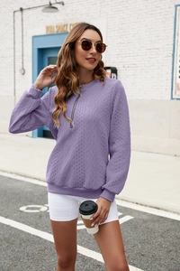 Detailed knit texture and quarter-zip collar on this lilac long-sleeve sweater for women