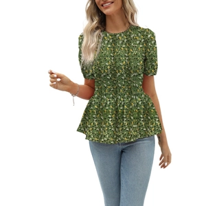 Close-up of women's peplum floral blouse with puff sleeves and elastic waist details