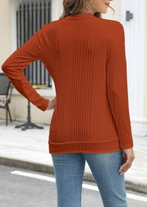 Back view of a rust red ribbed knit long sleeve shirt with a slim fit silhouette