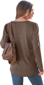 Detailed back view of a dark brown long-sleeve knit top with pleated puff shoulders