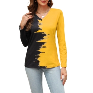 Detail of V-neck long sleeve top with black and yellow contrast zigzag print patterns