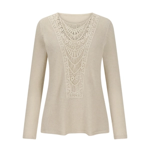 Detailed view of beige waffle knit top with intricate crochet lace neckline patterns