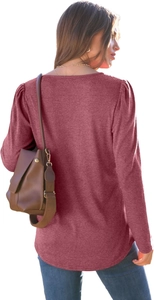 Detail view of the back silhouette and pleated puff sleeve texture of a mauve long-sleeve tee