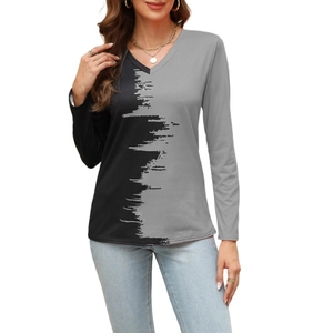 Detail of V-neck long sleeve top with black and grey artistic brushstroke texture print