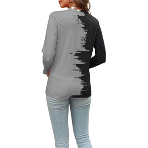 Rear view of women's long sleeve V-neck top with artistic gray and black color block print