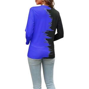 Detail view showing the unique zigzag patchwork back design of the V-neck long sleeve shirt