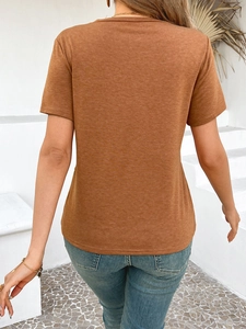 Back view of a casual slim fit tan short sleeve knitted t-shirt for women in a chic style
