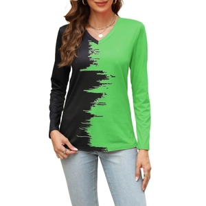 Detail of V-neck long sleeve top with black and green brushstroke print contrast design