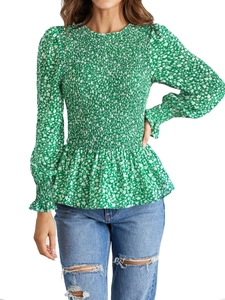 Women's green floral long sleeve smocked blouse with elastic bodice and ruffle hem