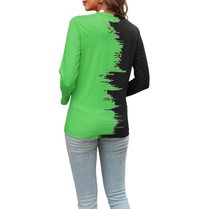 Detail view of women's long sleeve T-shirt with green and black split contrast print