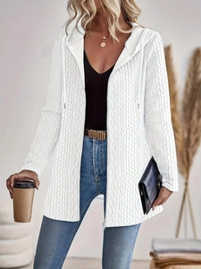 Detailed view of the thick cable knit texture on a white hooded zip-up cardigan