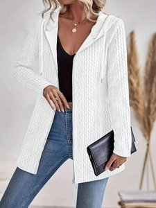 Detail of white cable knit texture and zipper closure on women's hooded cardigan