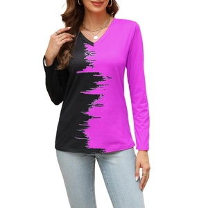 Detail of V-neck long sleeve top featuring black and purple brushstroke color block design