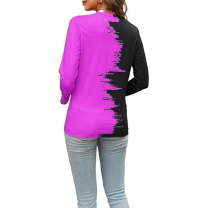 Detail showing the brushstroke patchwork of purple and black on women's long sleeve top