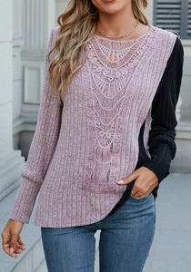 Close-up of lavender knit top featuring intricate floral lace patchwork and ribbed texture