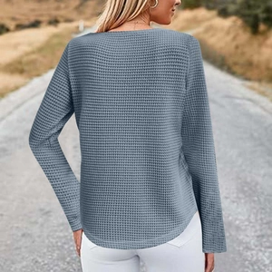 Back view of gray waffle knit long sleeve top with curved hem and crew neck casual design