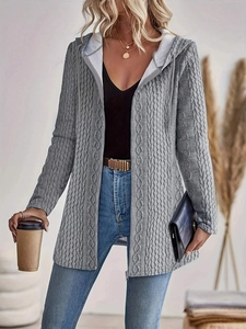 Detail of grey cable knit hooded cardigan showing zipper and textured braiding