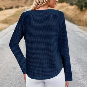 Detail view showing navy waffle knit texture and curved hemline of the long sleeve t-shirt