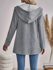Detailed back view of a grey cable knit hooded cardigan with textured twist patterns