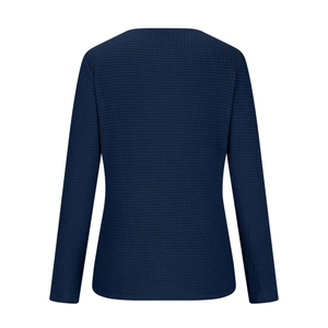 Rear view detail of dark blue long sleeve waffle knit shirt with textured fabric