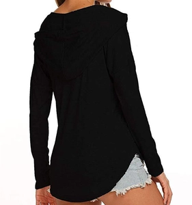 Rear view of black long sleeve hoodie with curved hem and side slits on high-quality knit
