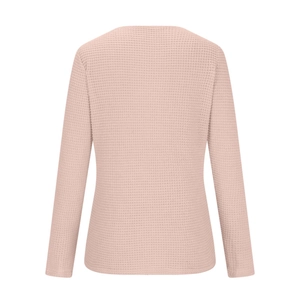 Detailed back view of pink waffle knit long sleeve top featuring scalloped lace trim texture