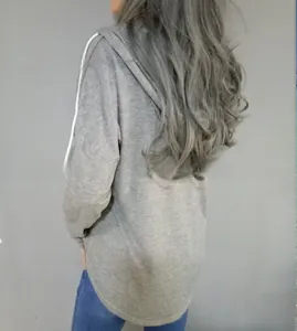 Back view of a casual loose light gray oversized hoodie with drawstring detail