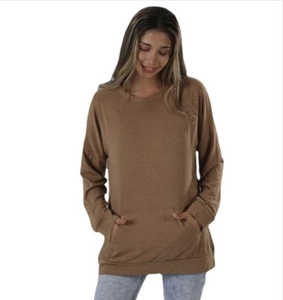 Detail of loose fit brown crewneck sweatshirt featuring a front kangaroo pocket and long sleeves