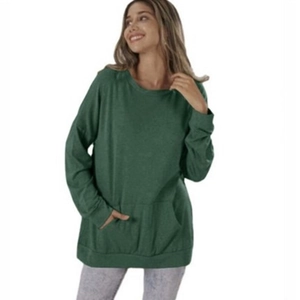 Close-up of a dark green crewneck sweatshirt featuring a kangaroo pocket and ribbed cuffs