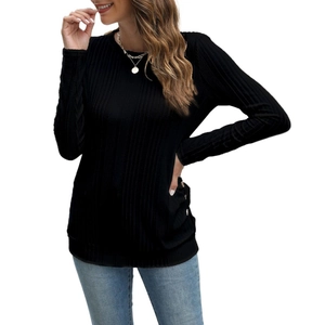 Women's long sleeve black ribbed knit t-shirt with crew neck and side decorative buttons